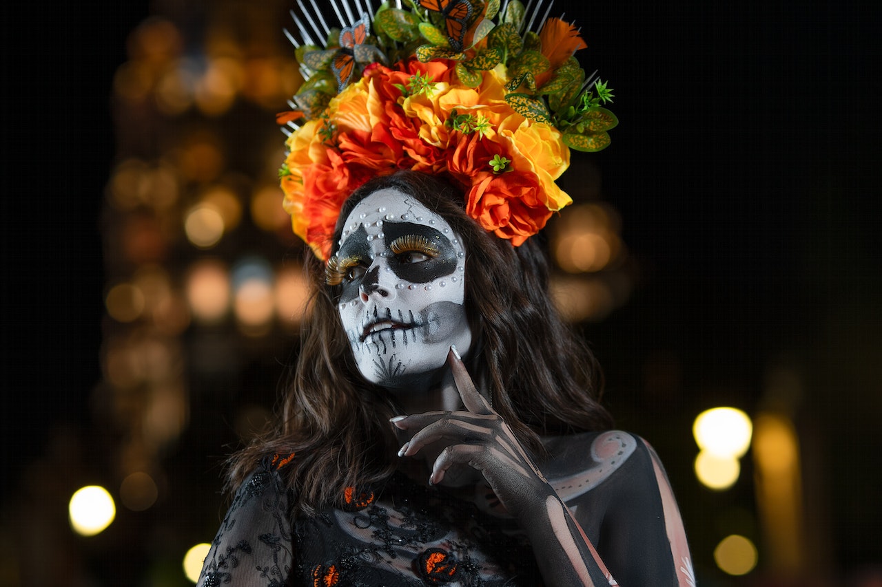 Lady dressed as skeleton with the face paint